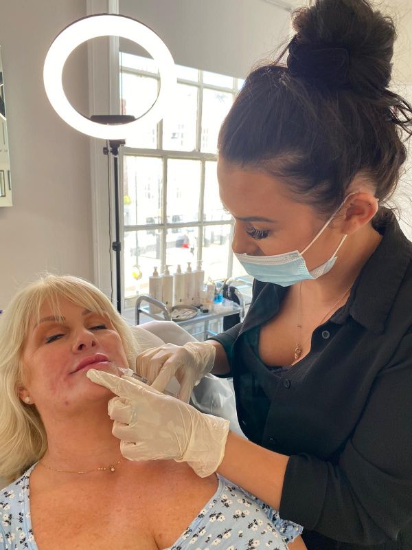 trainee learning how to do botox and dermal filler